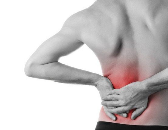 A man feels acute pain under his shoulder blade
